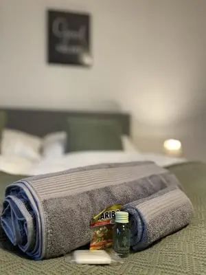 Ein Bett oder Betten in einem Zimmer der Unterkunft Panorama Home mit Weitblick auf die City