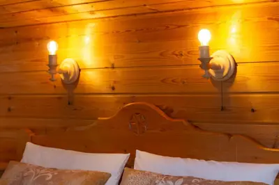 Ein Bett oder Betten in einem Zimmer der Unterkunft Gästehaus Kayetan