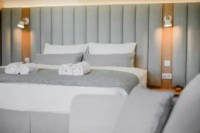Ein Bett oder Betten in einem Zimmer der Unterkunft BRIGHT: Rosenheim Aicherpark