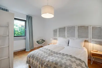 Ein Bett oder Betten in einem Zimmer der Unterkunft Ferienwohnung mit Garten am Chiemsee