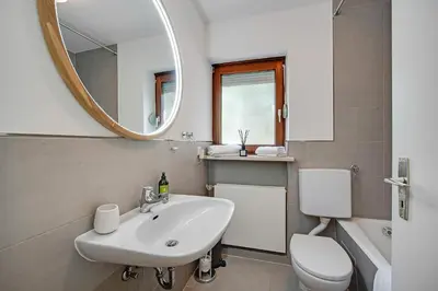 Ein Badezimmer in der Unterkunft Ferienwohnung mit Garten am Chiemsee
