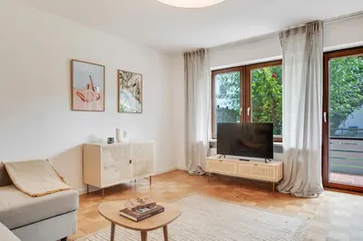 Ein Sitzbereich in der Unterkunft Ferienwohnung mit Garten am Chiemsee