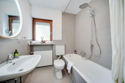 Ein Badezimmer in der Unterkunft Ferienwohnung mit Garten am Chiemsee