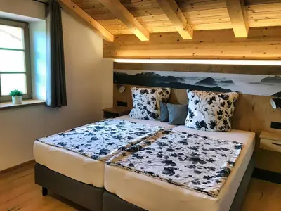 Ein Bett oder Betten in einem Zimmer der Unterkunft Ferienwohnung Kaindl