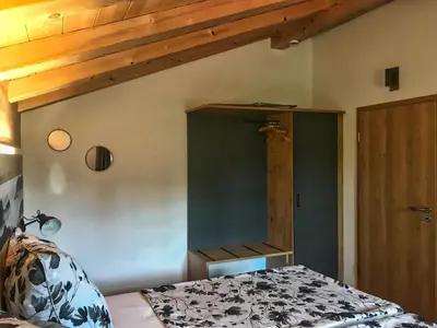 Ein Bett oder Betten in einem Zimmer der Unterkunft Ferienwohnung Kaindl