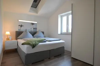 Ein Bett oder Betten in einem Zimmer der Unterkunft 