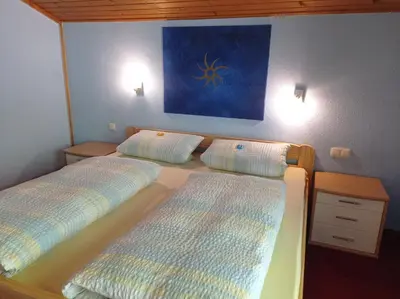 Ein Bett oder Betten in einem Zimmer der Unterkunft Ferienwohnung Moser Brunhilde