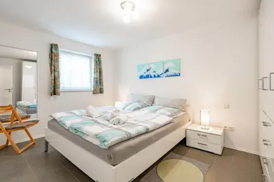 Ein Bett oder Betten in einem Zimmer der Unterkunft Ferienwohnungen Christoph