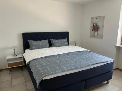 Ein Bett oder Betten in einem Zimmer der Unterkunft Schöner Ausblick