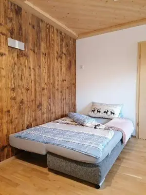 Ein Bett oder Betten in einem Zimmer der Unterkunft Ferienwohnung Bauer
