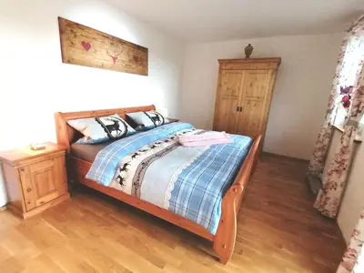 Ein Bett oder Betten in einem Zimmer der Unterkunft Ferienwohnung Bauer