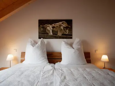 Ein Bett oder Betten in einem Zimmer der Unterkunft Ferienhof Kohler