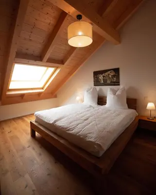 Ein Bett oder Betten in einem Zimmer der Unterkunft Ferienhof Kohler