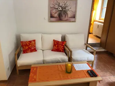 Ein Sitzbereich in der Unterkunft Ferienwohnung Wasserfall