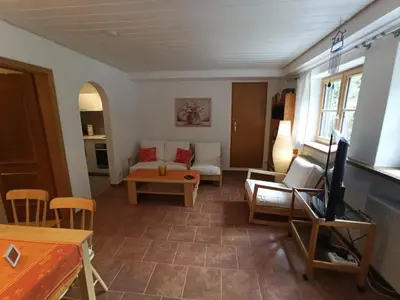 Ein Sitzbereich in der Unterkunft Ferienwohnung Wasserfall