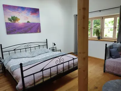 Ein Bett oder Betten in einem Zimmer der Unterkunft Ferienwohnung mit Herz
