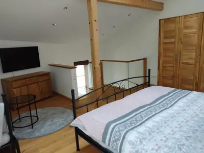 Ein Bett oder Betten in einem Zimmer der Unterkunft Ferienwohnung mit Herz