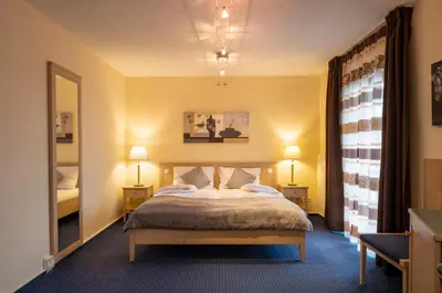 Ein Bett oder Betten in einem Zimmer der Unterkunft Servus Gelting