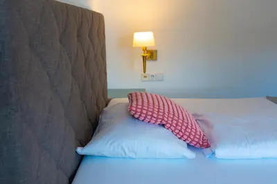 Ein Bett oder Betten in einem Zimmer der Unterkunft Servus Gelting