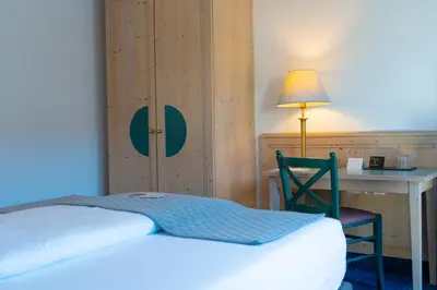 Ein Bett oder Betten in einem Zimmer der Unterkunft Servus Gelting