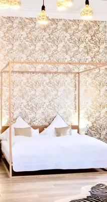 Ein Bett oder Betten in einem Zimmer der Unterkunft Puro-Design-Apartment Deluxe - very central