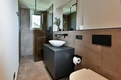 Ein Badezimmer in der Unterkunft BergCrystal