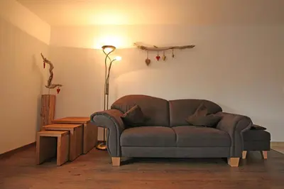 Ein Sitzbereich in der Unterkunft Gästehaus Dreitorspitz