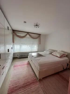 Ein Bett oder Betten in einem Zimmer der Unterkunft Alpine Retreat