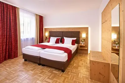 Ein Bett oder Betten in einem Zimmer der Unterkunft Park Hotel Laim Serviced Apartments