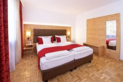 Ein Bett oder Betten in einem Zimmer der Unterkunft Park Hotel Laim Serviced Apartments
