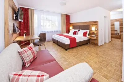 Ein Bett oder Betten in einem Zimmer der Unterkunft Park Hotel Laim Serviced Apartments