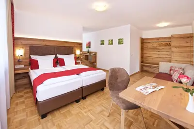 Ein Bett oder Betten in einem Zimmer der Unterkunft Park Hotel Laim Serviced Apartments