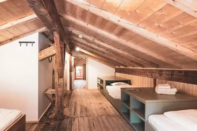 Ein Bett oder Betten in einem Zimmer der Unterkunft STUBN in der Frasdorfer Hütte