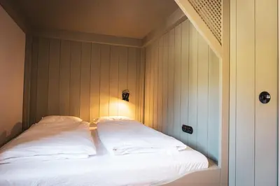Ein Bett oder Betten in einem Zimmer der Unterkunft STUBN in der Frasdorfer Hütte