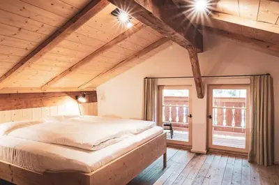 Ein Bett oder Betten in einem Zimmer der Unterkunft STUBN in der Frasdorfer Hütte