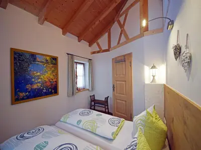 Ein Bett oder Betten in einem Zimmer der Unterkunft Bosch Hermann