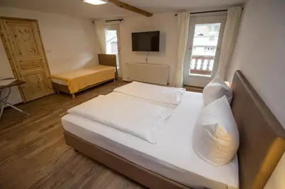 Ein Bett oder Betten in einem Zimmer der Unterkunft Pension Oberwirt