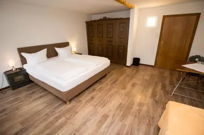 Ein Bett oder Betten in einem Zimmer der Unterkunft Pension Oberwirt
