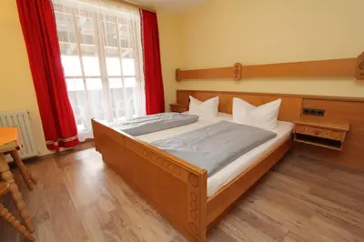 Ein Bett oder Betten in einem Zimmer der Unterkunft Pension Oberwirt