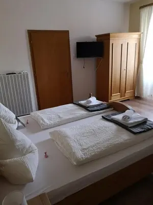 Ein Bett oder Betten in einem Zimmer der Unterkunft Pension Oberwirt