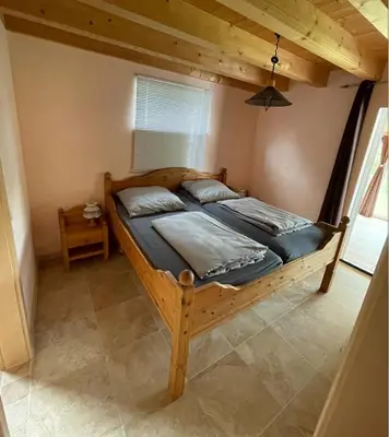 Ein Bett oder Betten in einem Zimmer der Unterkunft Ferienhaus Stefanie