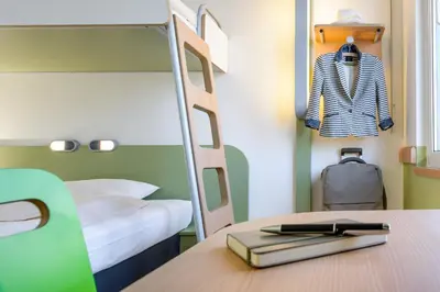 Ein Bett oder Betten in einem Zimmer der Unterkunft Ibis budget München Airport Erding