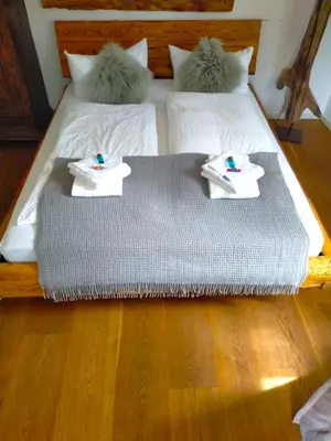 Ein Bett oder Betten in einem Zimmer der Unterkunft Ferienwohnung 