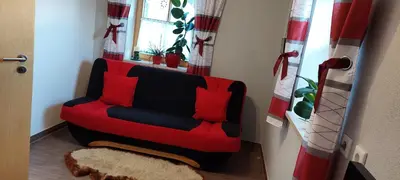 Ein Sitzbereich in der Unterkunft Ferienwohnung Abendrot