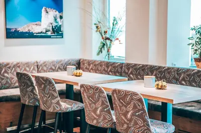 Ein Sitzbereich in der Unterkunft Hotel Schwertfirm