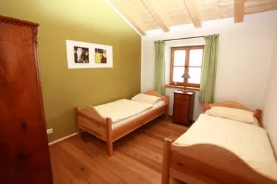 Ein Bett oder Betten in einem Zimmer der Unterkunft Springerhof