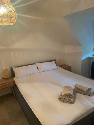 Ein Bett oder Betten in einem Zimmer der Unterkunft Old town comfort and cozy apartment