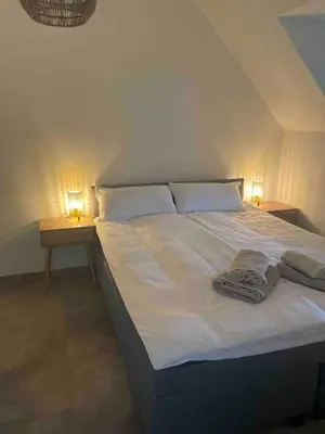 Ein Bett oder Betten in einem Zimmer der Unterkunft Old town comfort and cozy apartment