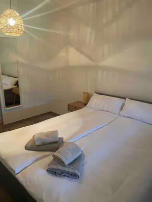 Ein Bett oder Betten in einem Zimmer der Unterkunft Old town comfort and cozy apartment