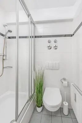 Ein Badezimmer in der Unterkunft Zwei Zimmer Wohnung im Stadtzentrum mit Tiefgaragenplatz